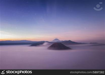 Bromo, Batok and Semeru volcanoes at night, Java island, Indonesia
