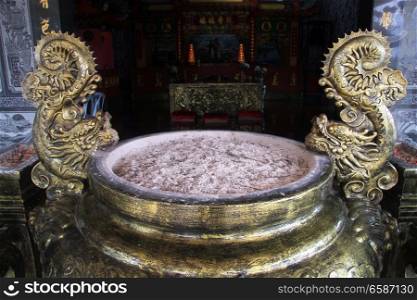 Bronze copper with ashes in chinese buddhist temple, Malaysia