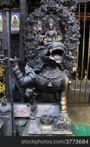 Bronze divinity in buddhist temple in Patan, Nepal