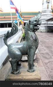 Bronze lion sculpture in the wat Pho in Thailand