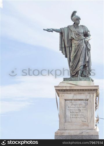 bronze statue indicate. In front of a bronze staure of Carlo Felice in Cagliari - Sardinia Italy