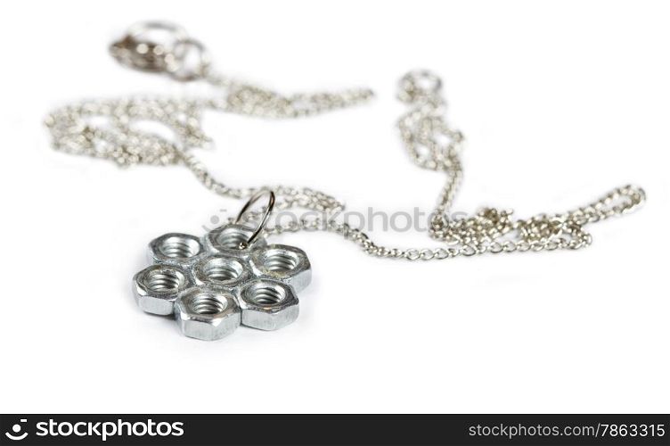 brooch made of steel nuts on a white background