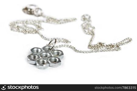 brooch made of steel nuts on a white background