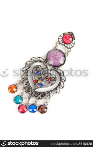 brooch with different gems isolated on a white