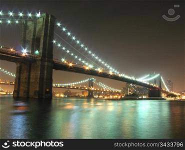Brooklyn and Manhattan bridges at night, New York City