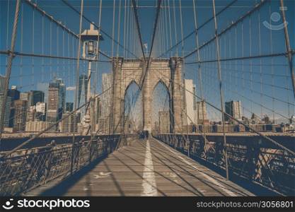 Brooklyn bridge at the morning, USA downtown skyline, Architecture and building with tourist concept