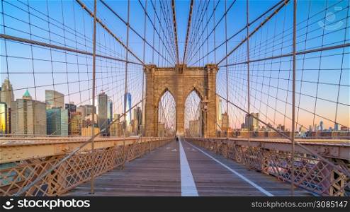 Brooklyn Bridge in New York City, USA at sunrise
