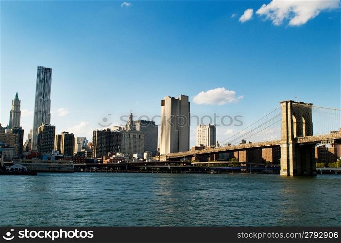 Brooklyn bridge in New York on bright summer day