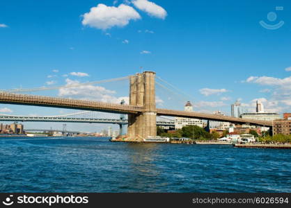 Brooklyn bridge in New York on bright summer day