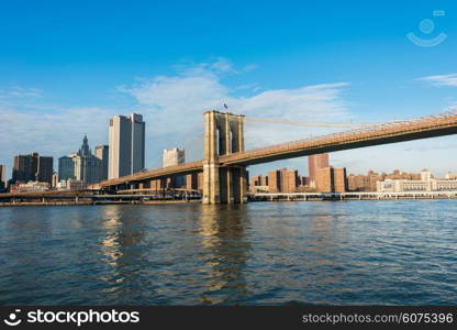 Brooklyn bridge in New York on bright summer day