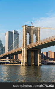 Brooklyn bridge in New York on bright summer day