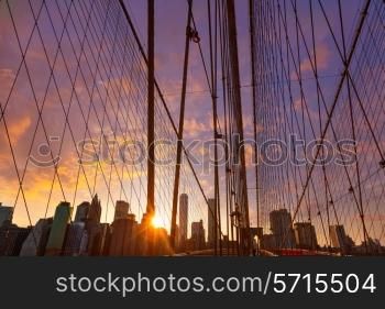 Brooklyn Bridge sunset with Manhattan skyline of New York City USA