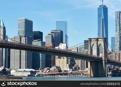 Brooklyn Bridge with lower Manhattan skyline in New York City