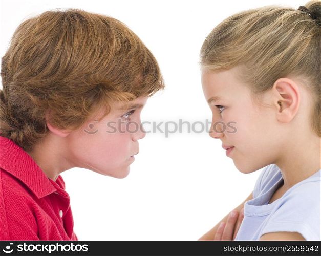 Brother and sister staring at each other