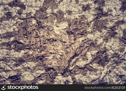 Brown abstract background, old crumpled paper, creative stylish wallpaper, grunge rustic texture, decorative element for wall