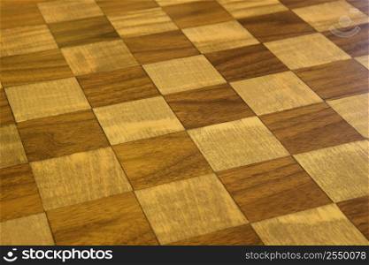 Brown and tan checkered wooden floor.