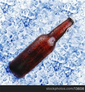 brown beer bottle in ice bucket with condensation