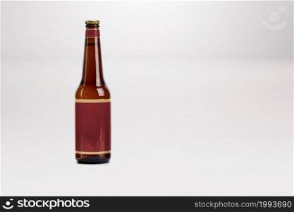 Brown Beer Bottle Mock-Up isolated on white - Blank Label