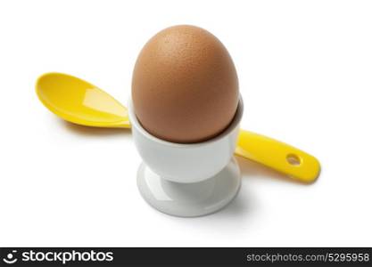 Brown boiled egg in an eggcup