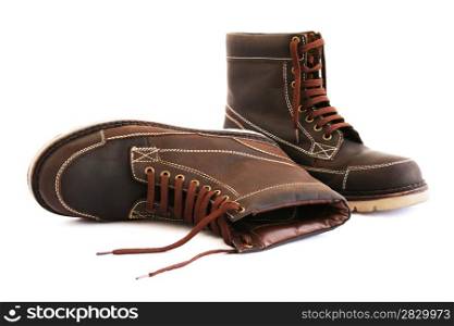 Brown boots isolated on white background.