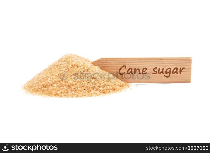 Brown cane sugar at plate