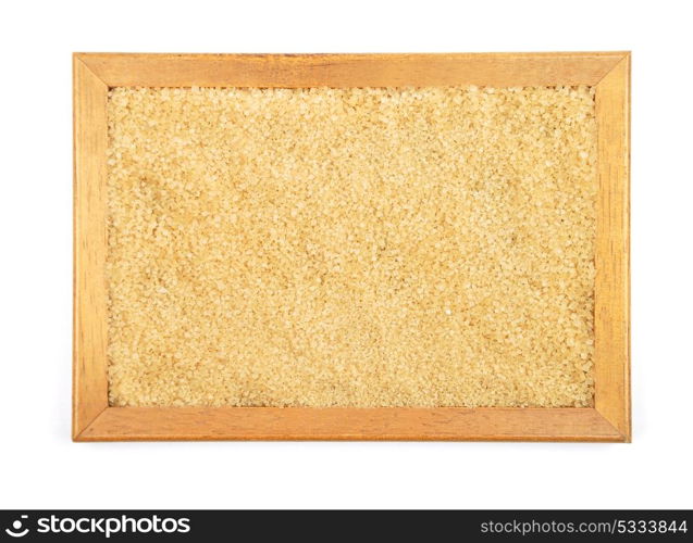 Brown cane sugar in frame