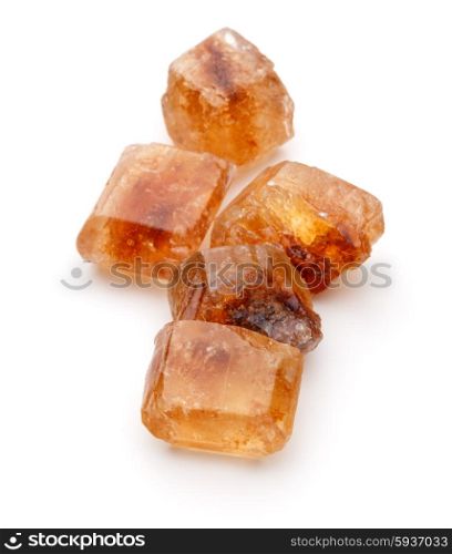 Brown caramelized lump cane sugar cube isolated on white background cutout