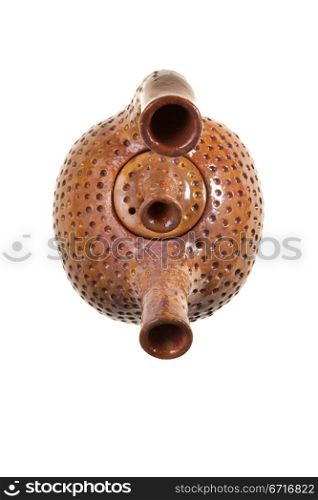 brown ceramic teapot isolated on white