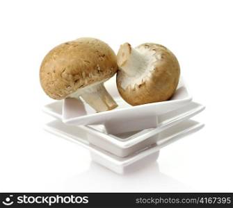 Brown Champignons In A White Bowl , Close Up