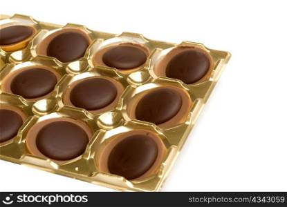 brown chocolates isolated on white background
