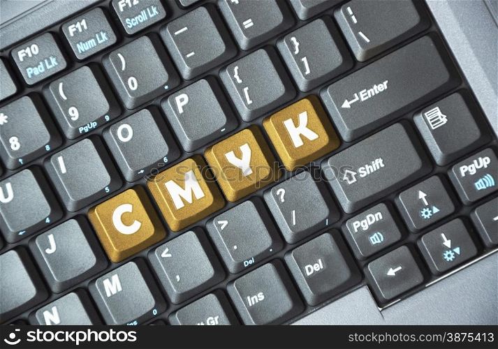 Brown cmyk key on keyboard