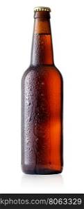 Brown cold beer bottle with drops isolated on white background. Brown cold beer bottle with drops