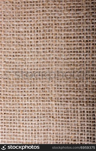 Brown color linen canvas as a background texture. Brown color linen canvas as background texture