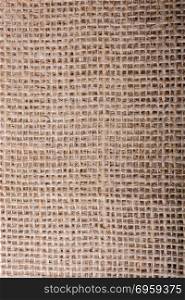 Brown color linen canvas as a background texture. Brown color linen canvas as background texture