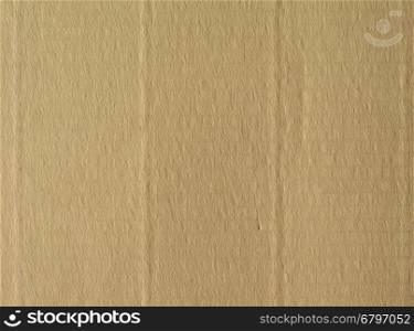 Brown corrugated cardboard texture background. Brown corrugated cardboard texture useful as a background