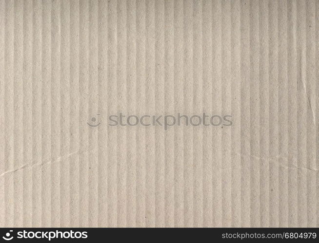 Brown corrugated cardboard texture background. Brown corrugated cardboard texture useful as a background