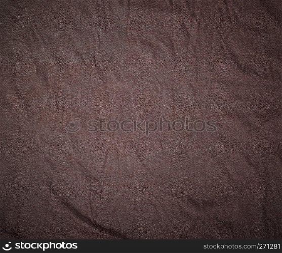 brown crumpled cotton stretching soft fabric, full frame