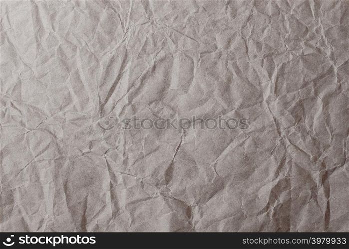 Brown crumpled creased paper bag for background or backdrop