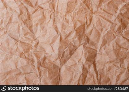 Brown crumpled folded paper for background or backdrop