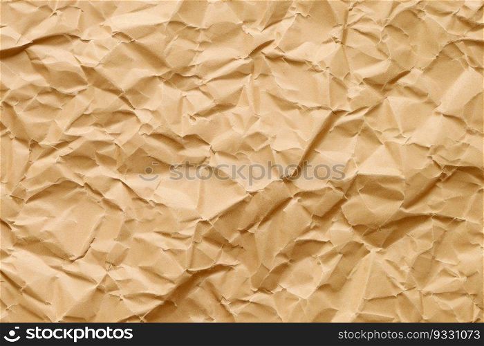 Brown crumpled paper texture. Abstract brown recycled paper background