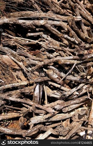 Brown dried stacked firewood pattern wood background