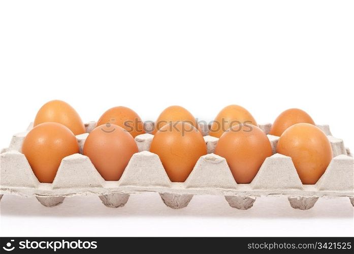 Brown eggs in box