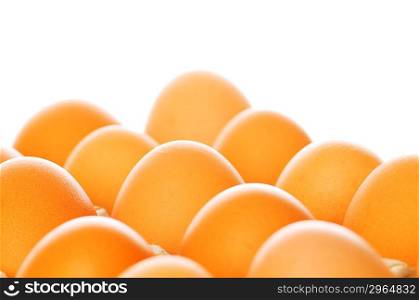Brown eggs isolated on white - focus on middle egg
