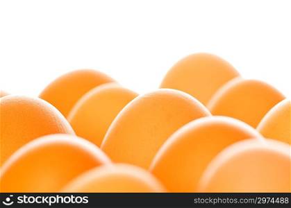 Brown eggs isolated on white - focus on middle egg