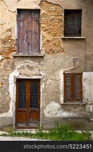 brown europe italy lombardy in the milano old window closed brick abstract door terrace