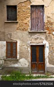brown europe italy lombardy in the milano old window closed brick abstract door terrace