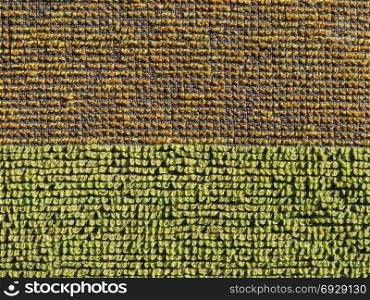 brown green fabric texture background. brown and green fabric texture useful as a background