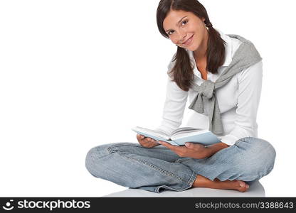 Brown hair teenager holding book on white background