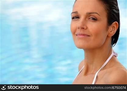 Brown-haired woman in swimming pool