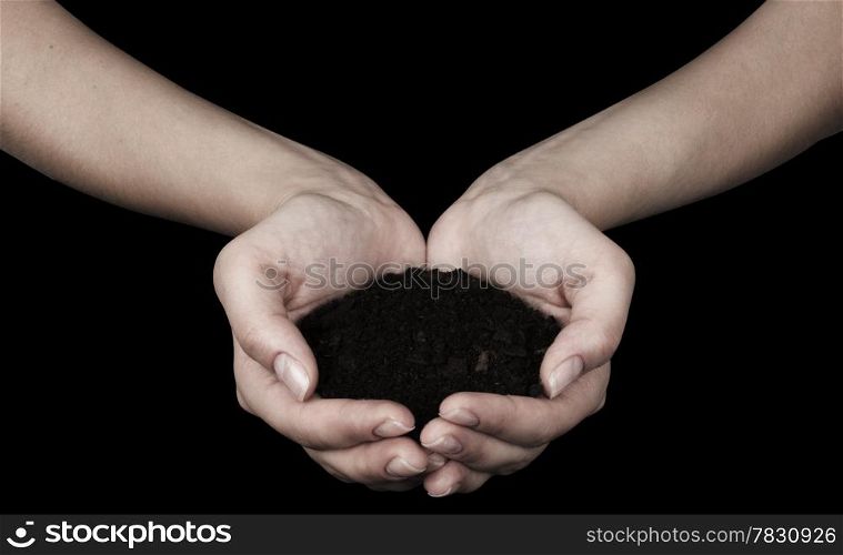 Brown Land and humman hand (on hand)